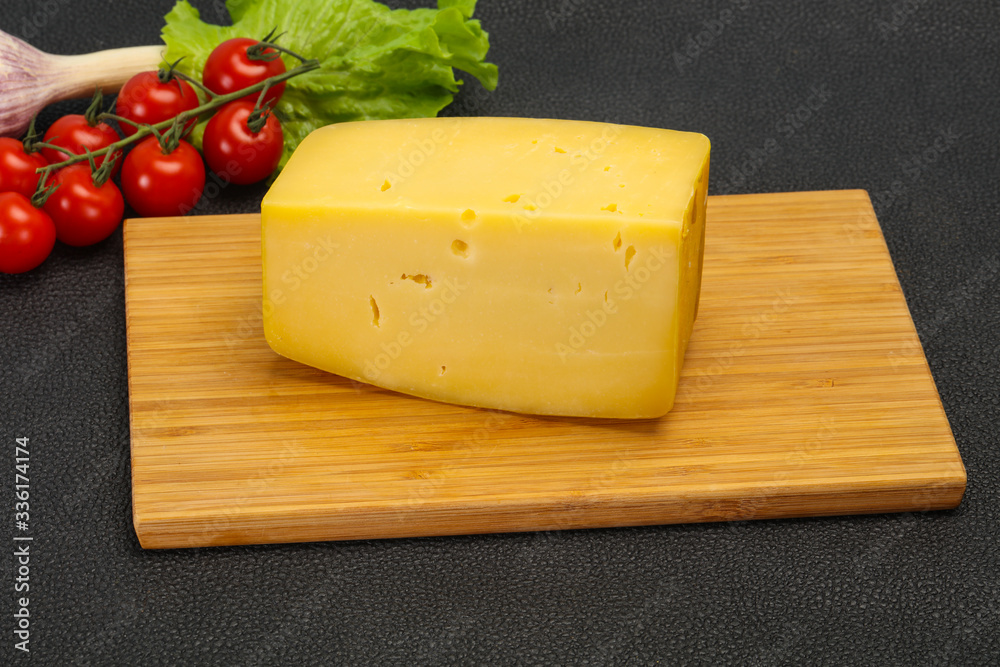 Hard yellow tasty cheese brick Hard yellow tasty cheese brick