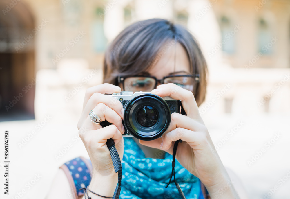 portrait of a beautiful girl with the camera