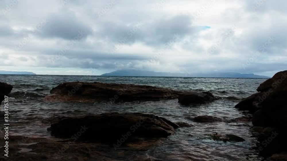 Low to the ground drone shot of ocean waterscape. Aerial video shot by a drone. Mallaig, Scotland, Isle of Skye Low to the ground drone shot of ocean waterscape. Aerial video shot by a drone. Mallaig, Scotland, Isle of Skye