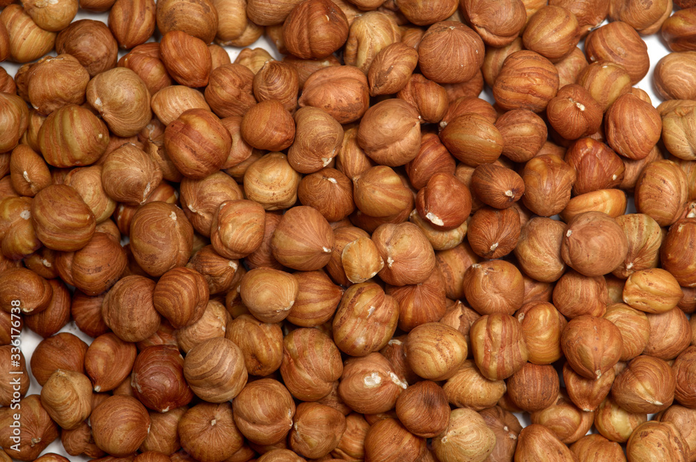 Nut background of hazelnut fruits. Food background. Top view of hazelnut nuts Nut background of hazelnut fruits. Food background. Top view of hazelnut nuts