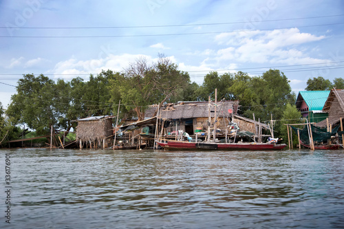 floating house and boat on the river in asian