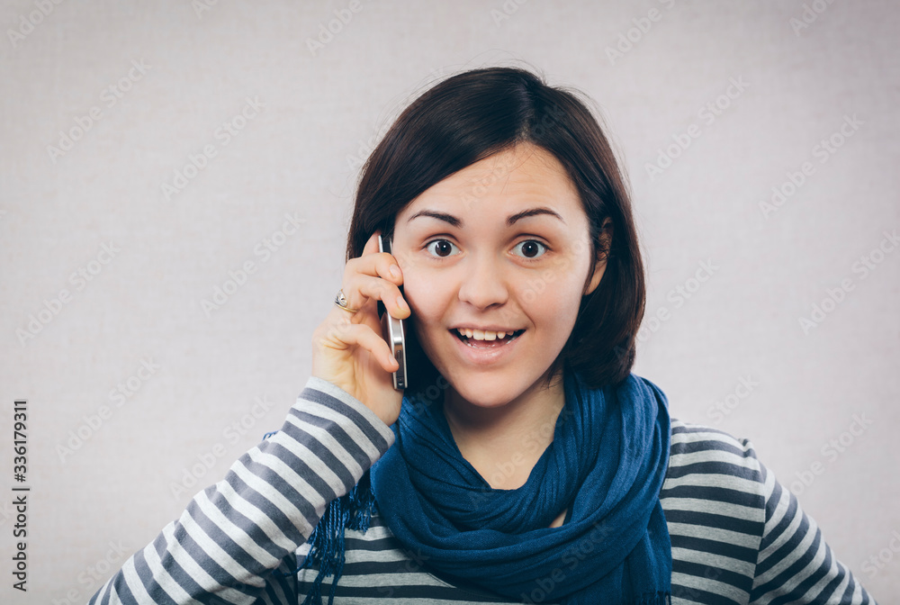 young girl speaks by mobile phone young girl speaks by mobile phone