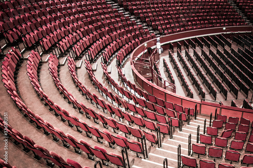 Canvas Print Empty red velvet seats of London west end theatre venue