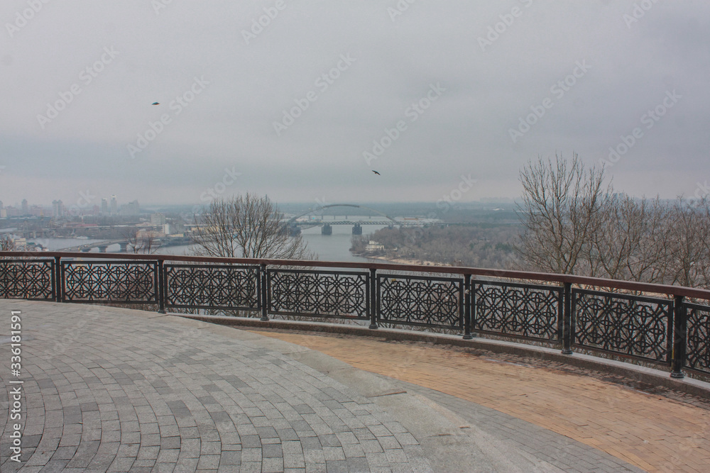 Landscape terrace with a view of the trees and spring Kiev on the Dnieper River, Ukraine.