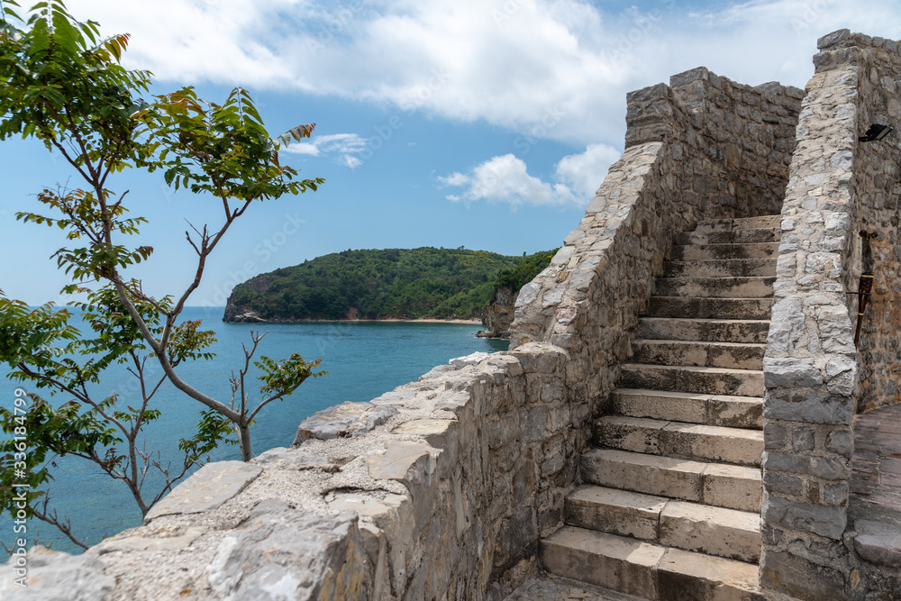 Ancient stone staircase in the old town in Budva. Ancient stone staircase in the old town in Budva.