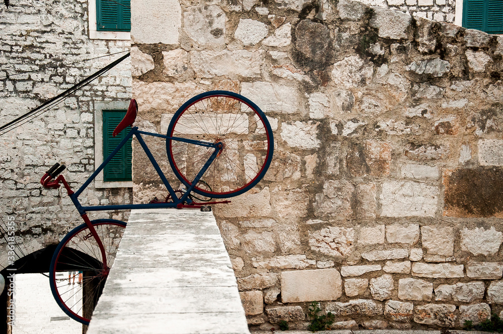 decorative bicycles on facades of houses and villages