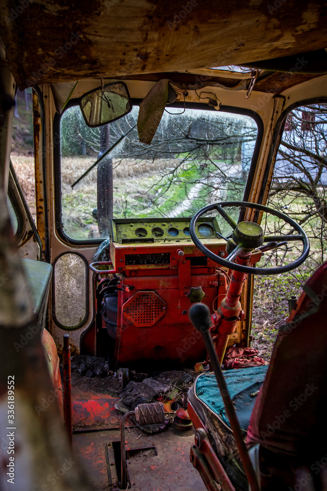 An old abandoned tractor in a former military area