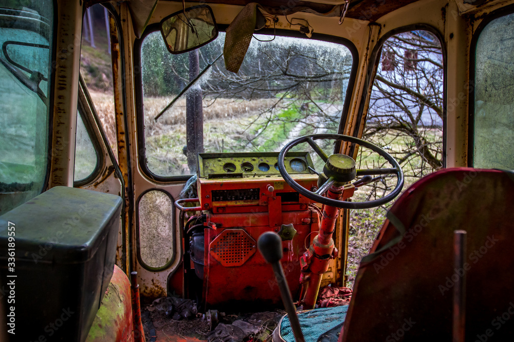 An old abandoned tractor in a former military area