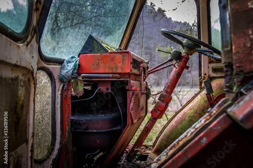 An old abandoned tractor in a former military area