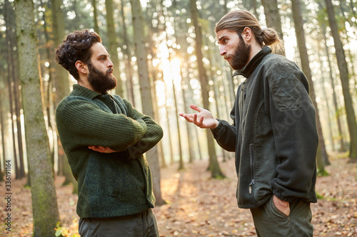 Two forest workers or foresters in conversation © Robert Kneschke