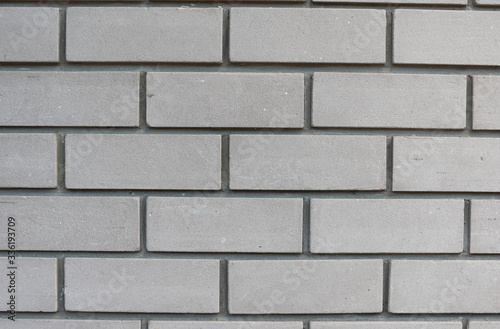 Texture of white brick wall with cement mortar. Background of silicate brick in the form of flat brickwork