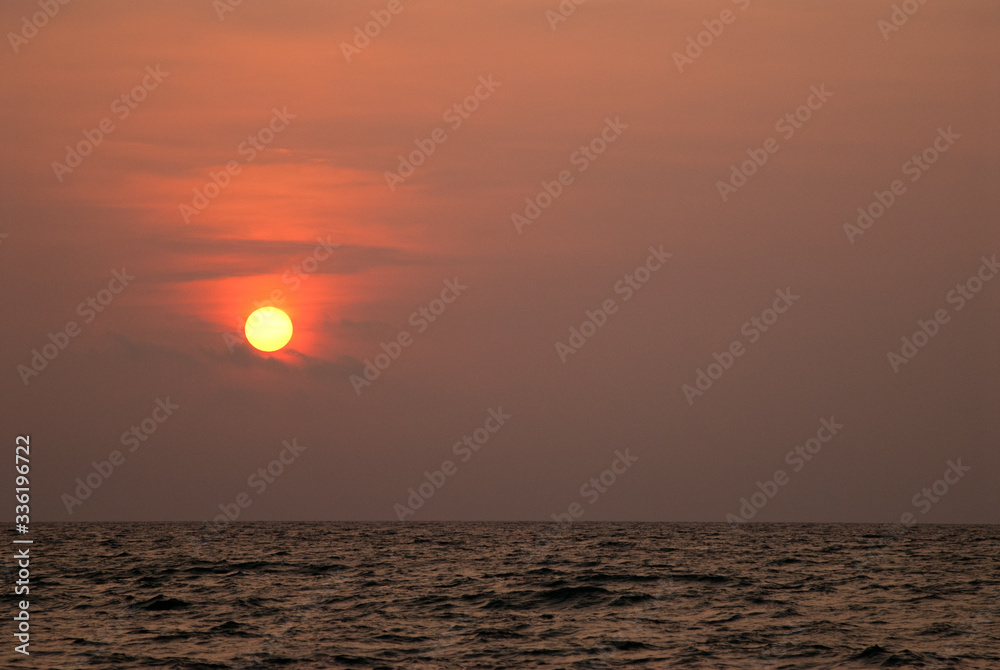 The setting sun in Phuket