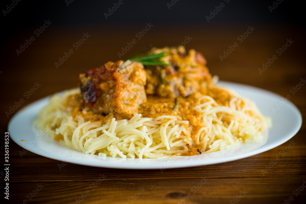 boiled vermicelli with meat and gravy in a plate boiled vermicelli with meat and gravy in a plate