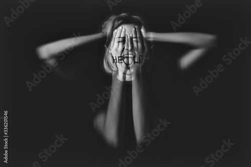 Photos Woman having panic attack on dark background