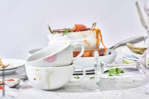 Close up of dirty crockery on table
