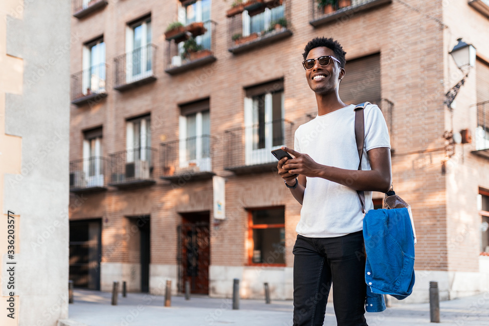 African man using mobile phone African man using mobile phone