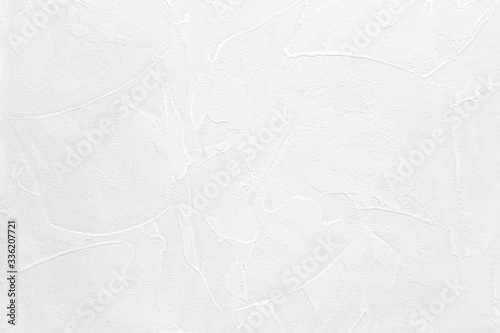 Textured white plaster on the wall. Background image, texture. photo