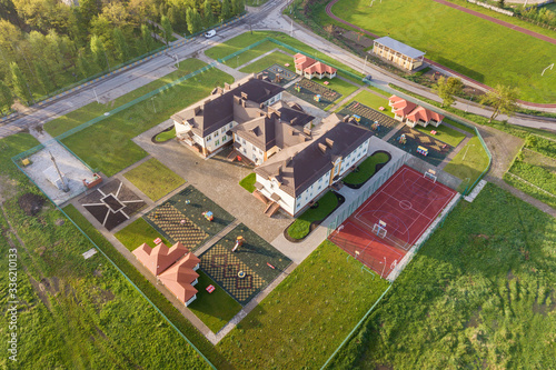 Aerial view of new prescool building in residential rural area. photo