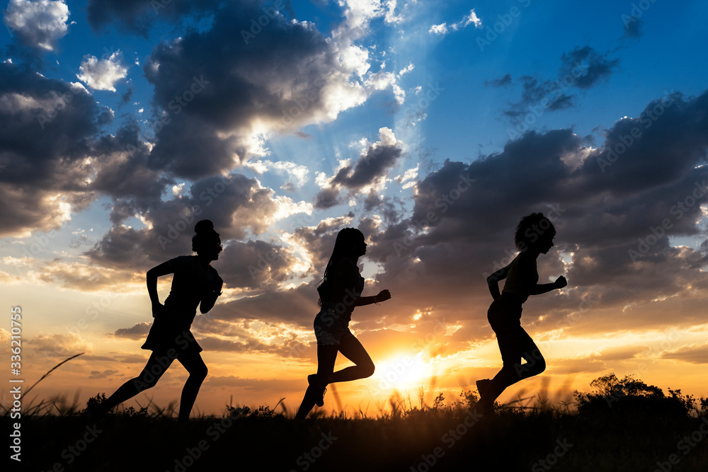 Unrecognizable girls running Unrecognizable girls running