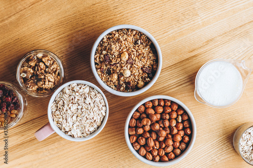 a delicious and crunchy oatmeal granola with honey  nuts  dried fruits and grains. Dynamic healthy food photography