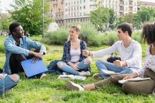 Young friends students together at the college photo