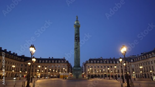 France, Paris,  View of place Vendome by night with Vendome column photo