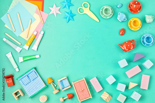 Colorful kids zero waste toys over bright background. Children gender neutral development and educational games, family activities at home during quarantine.Flat lay, top view