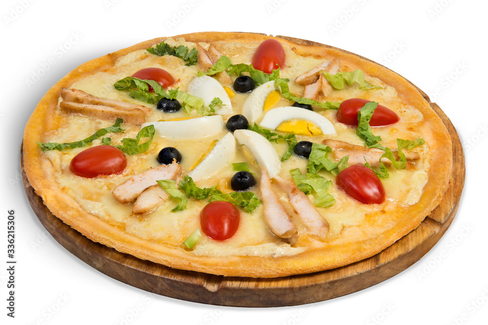 Pizza with cheese crust, chicken breast, tomatoes, eggs, lettuce and olives on a wooden round plate