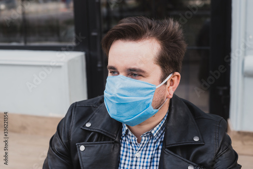 Man in protective mask, coronavirus, illness, infection, quarantine, medical mask