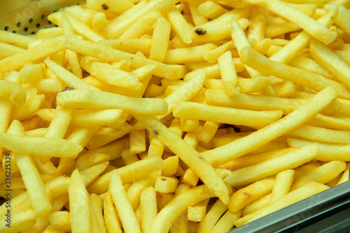 Delicious French fries piled up