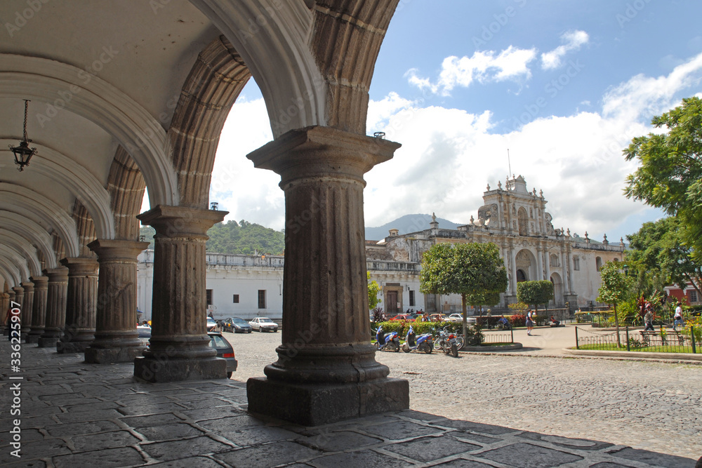 Guatemala - Antigua central square - old historic village with arcade and church