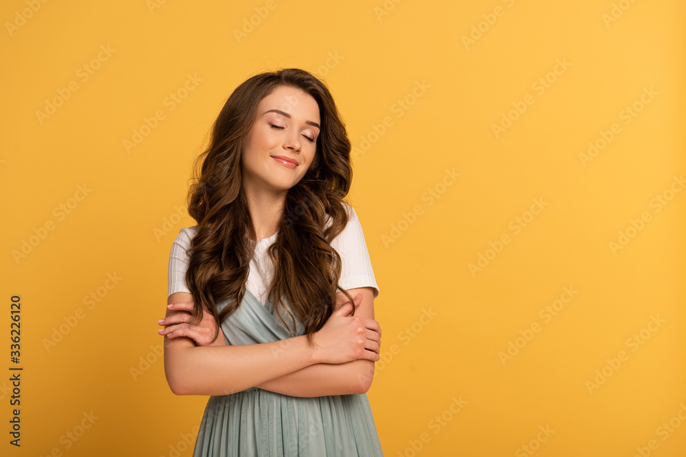 attractive dreamy spring girl in t-shirt and dress on yellow attractive dreamy spring girl in t-shirt and dress on yellow