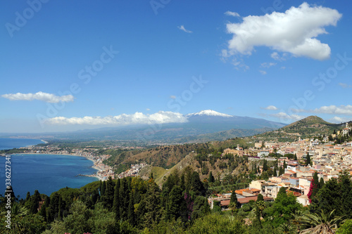 Italy - Sicily - Roman historic greek theater in syracuse and view of Etna volcano with snow 