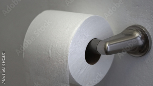 New roll of toilet paper in bathroom