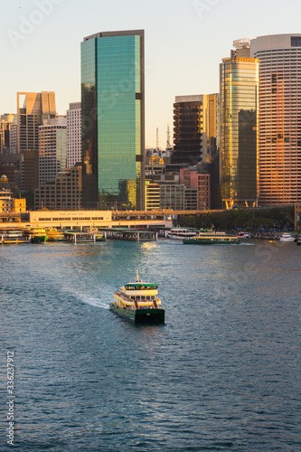 Sydney city with a ferry leaving Circular Quay photo