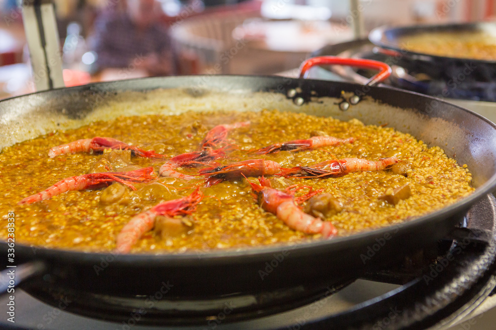 Amazing paella pan cooking on fire Amazing paella pan cooking on fire