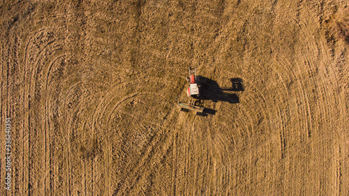 Aerial view of tractor in the field near Bjelopolje in Lika, Croatia. photo