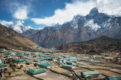 View over the Village of Khunde in Nepal to Himalayan Mountains photo