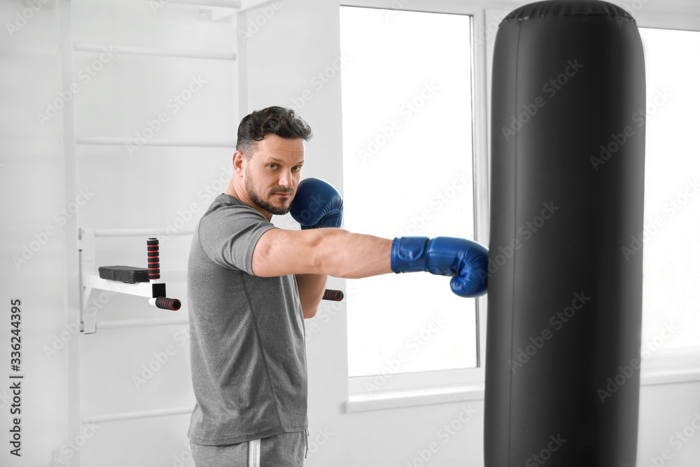 Male boxer training in gym Male boxer training in gym