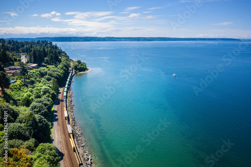 Wallpaper Mural Railroad Tracks Curve Along Puget Sound on Sunny Afternoon Day Torontodigital.ca