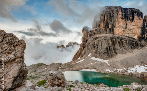 Low Clouds cover Staggering Peaks in the Dolomite Mountains of Italy