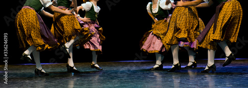Children dance on stage folk dances
