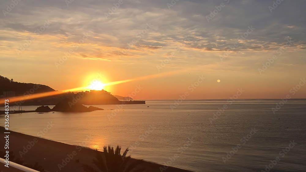 Early Morning Sunrise Over the Sa Palomera Hill in Spain, Blanes