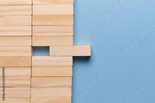 Wooden blocks on a blue background.