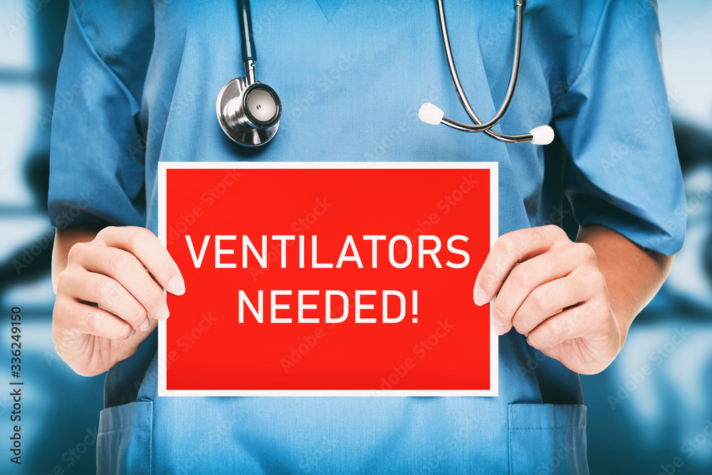 COVID-19 Ventilators needed urgency. Medical doctor or nurse showing sign asking for help holding red billboard with white text. Coronavirus. COVID-19 Ventilators needed urgency. Medical doctor or nurse showing sign asking for help holding red billboard with white text. Coronavirus.