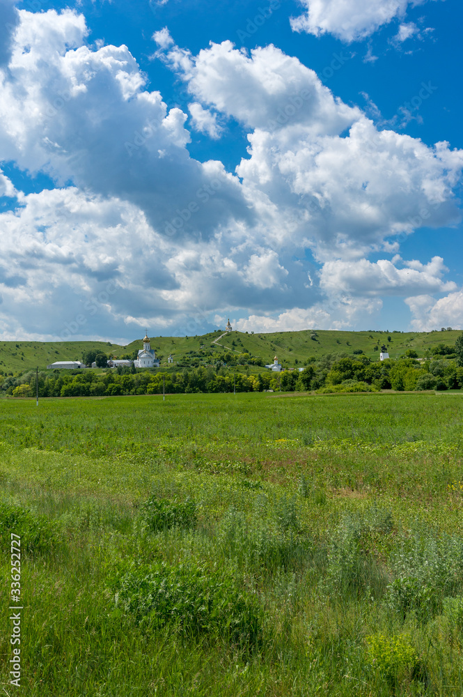 Obraz premium Countryside landscape with churches of Christian monastery