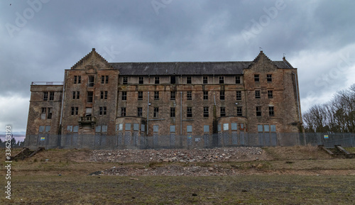 The remains of the abandoned Hartwood Hospital, a 19th century psychiatric hospital with imposing twin clock towers located in Scotland. Recent filming location for the new Batman movie 