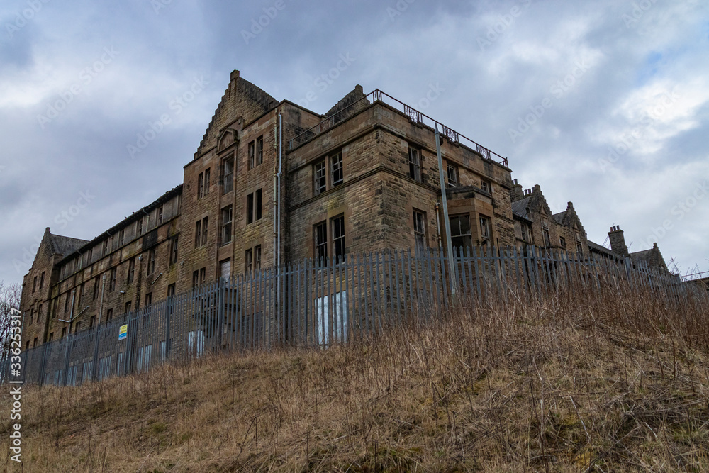 The remains of the abandoned Hartwood Hospital, a 19th century psychiatric hospital with imposing twin clock towers located in Scotland. Recent filming location for the new Batman movie 