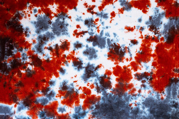 tie dye pattern hand dyed on cotton fabric abstract texture background.