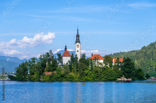 Amazing view on Bled Lake with church dedicated to the Assumption of Mary on a small island, Julian Alps, Slovenia © kateafter